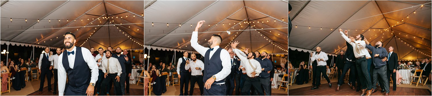 Garter Toss at the Wedding Reception - Groom tosses garter - http://brittneyhannonphotography.com