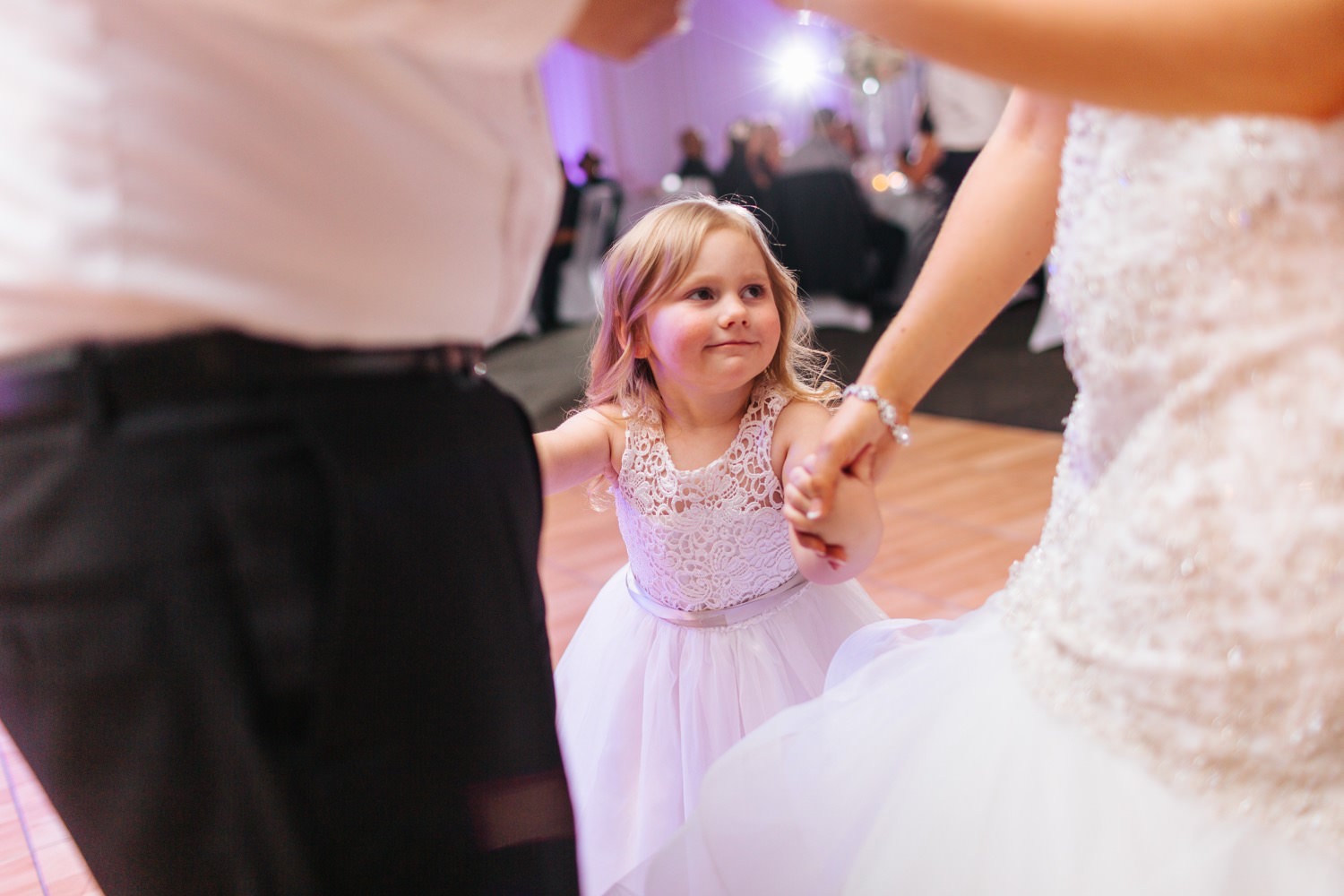 Guests dancing during Wedding Reception - https://brittneyhannonphotography.com