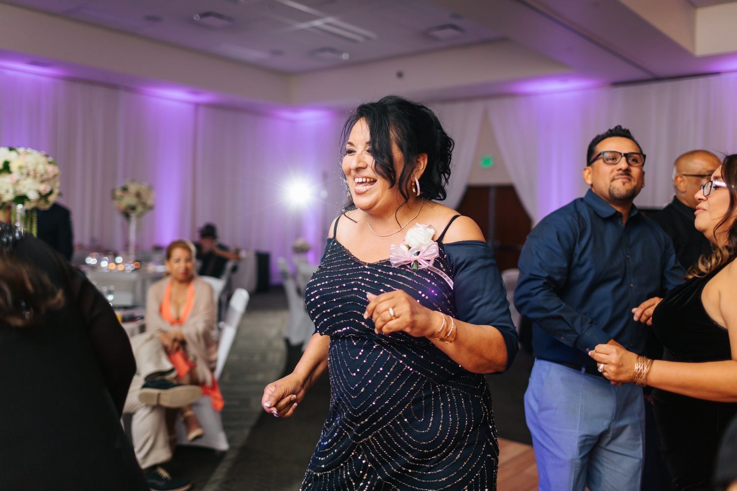 Guests dancing during Wedding Reception - https://brittneyhannonphotography.com