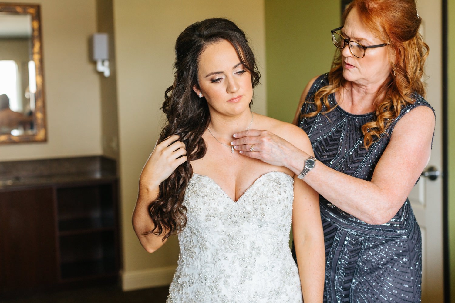 Special moment between bride and her mom - https://brittneyhannonphotography.com