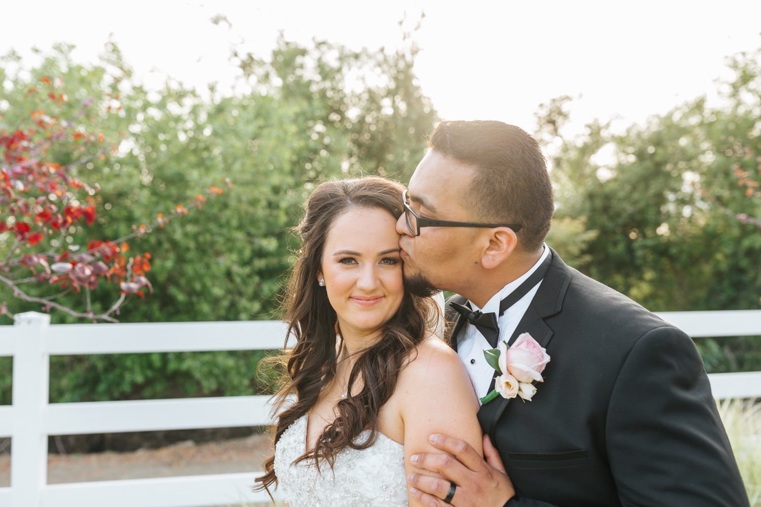 Groom kisses his bride - https://brittneyhannonphotography.com