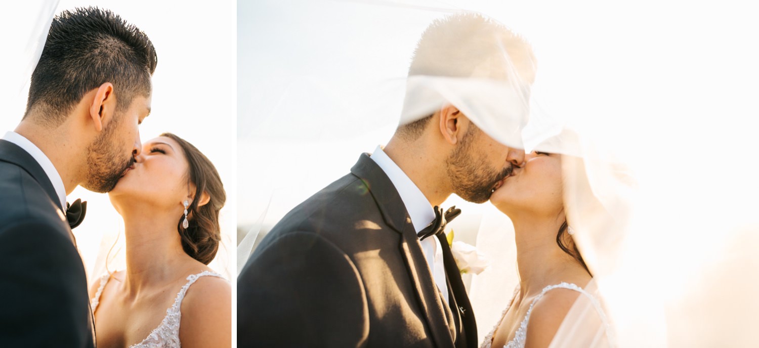 Bride and Groom kiss under veil - https://brittneyhannonphotography.com