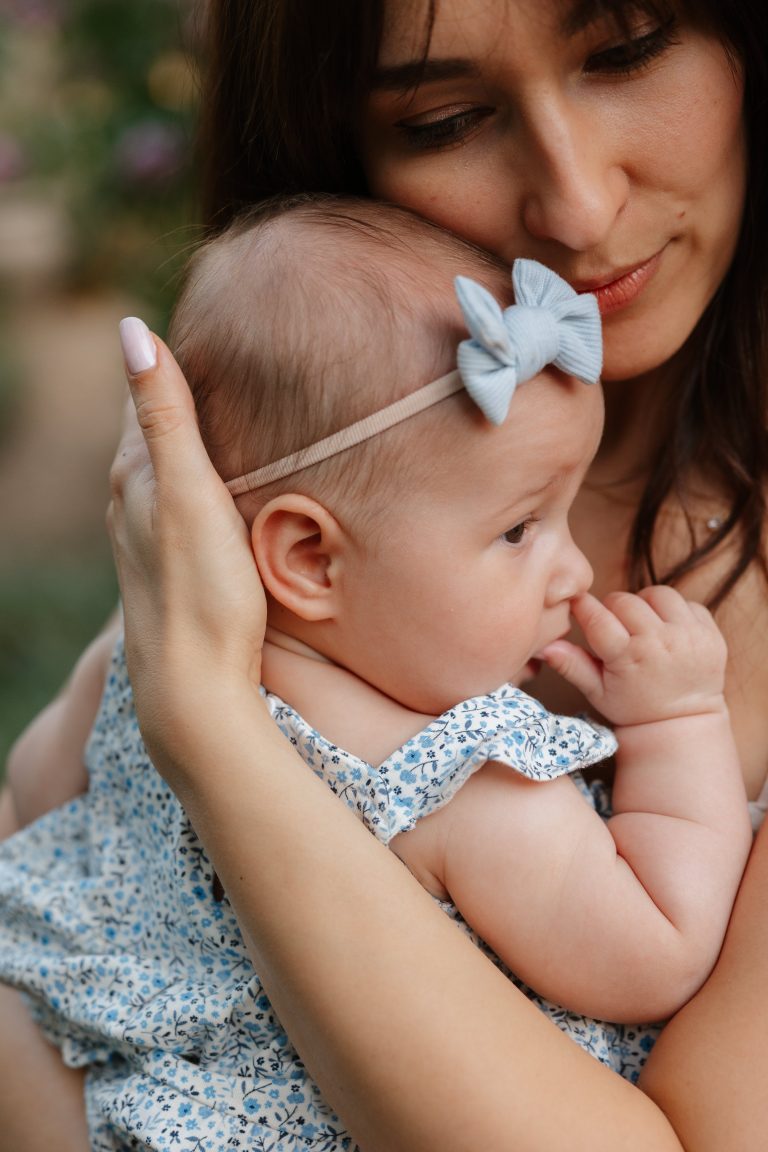 Mom and baby cuddling during family session in southern california